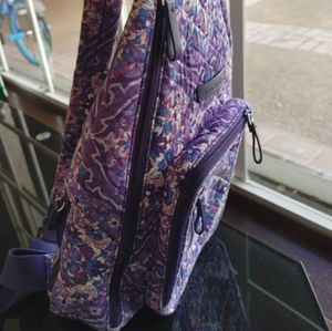 Vera Bradley Regal Rosetta half sling backpack.